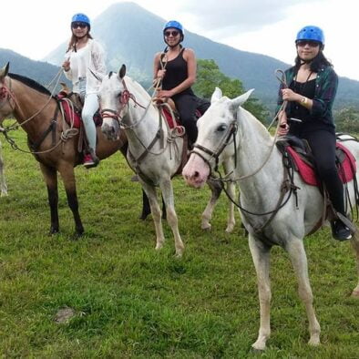 tourists riding horses