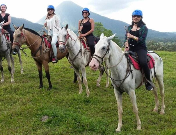 tourists riding horses