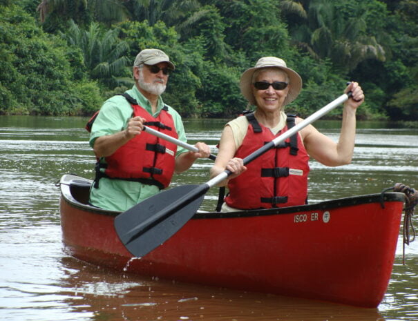 couple paddling on a canoe