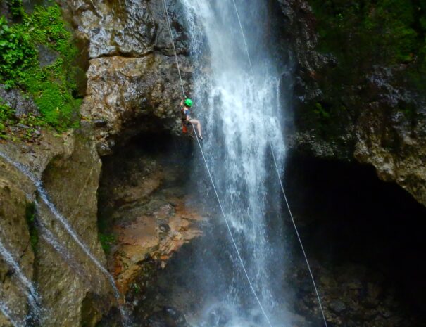 person practicing rappelling