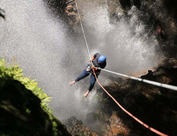 person practicing rappelling